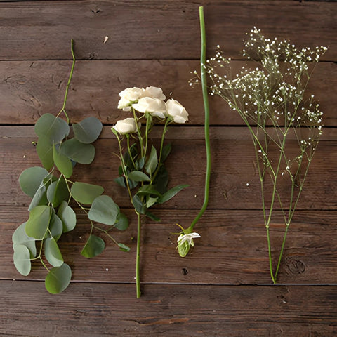 White flower greenery flatlay