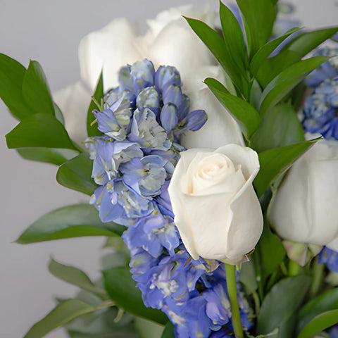 Dozen Cream Rose Table Arrangements