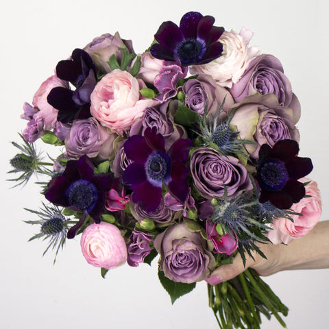 Stylish Purple Wholesale Flower Bouquet In a Hand