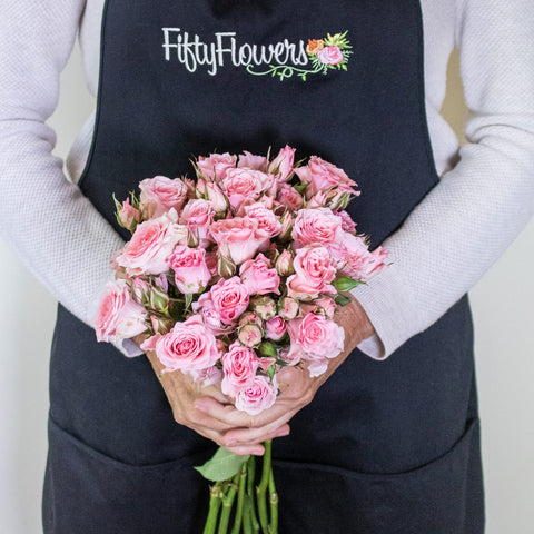 Elva Pink Spray Rose Bunch In a Hand