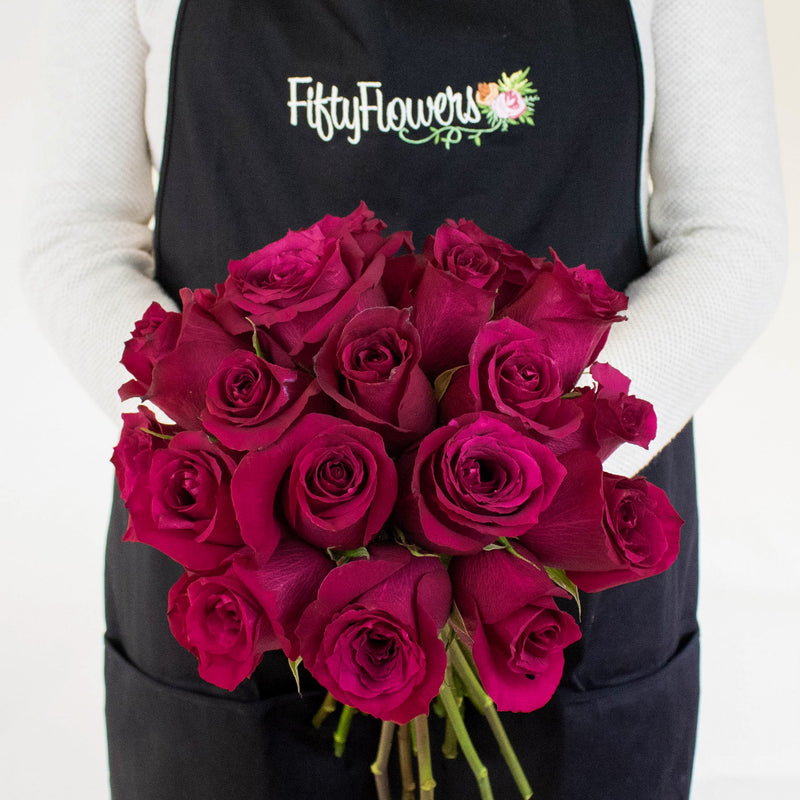 Merlot Red Valentines Rose Bunch in a Hand